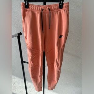 Orange Nike Tech Sweatpants